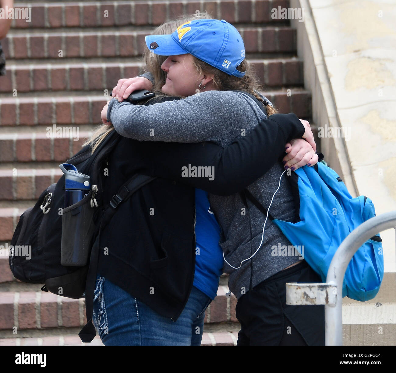 June 1, 2016. Westwood CA. Friends hug each other as they make their way out of class rooms after the lockdown was lifted. Today at UCLA after a murder-suicide Wednesday morning at UCLA left two dead, and prompted a campus-wide lockdown, according to the Los Angeles Police Department.'At about 10 this morning, a homicide and a suicide occurred on the southside, ' Los Angeles Police Chief Charlie Beck said in a news conference. 'It appears it was entirely contained. We believe there are no suspects outstanding and no continued threat to UCLA campus. We're in the process of releasing the ca Stock Photo