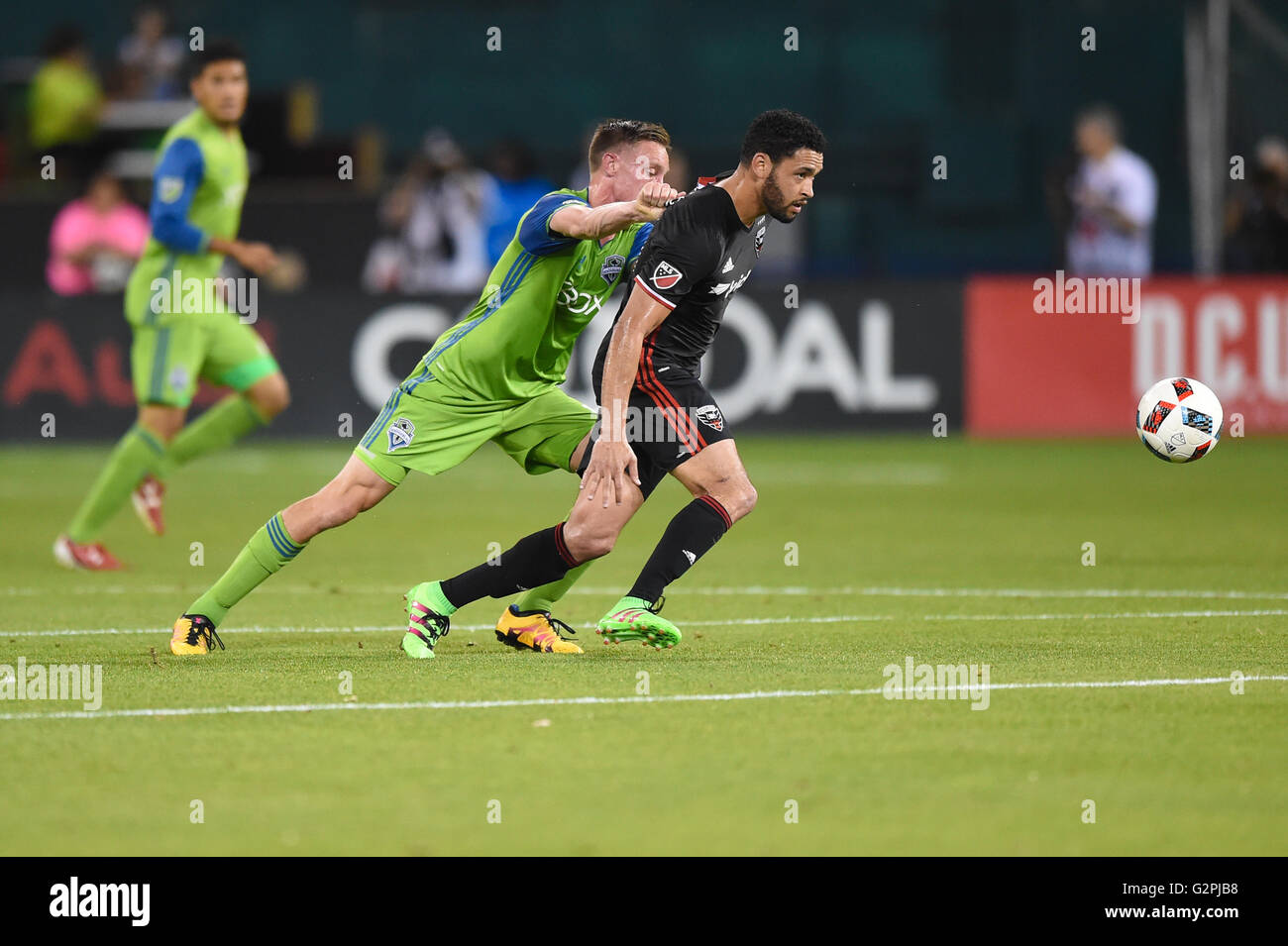 Washington DC, USA. 01st June, 2016. Seattle Sounders defender Dylan Remick (15) holds D.C. United midfielder Lamar Neagle (13) during the match between DC United and Seattle Sounders at RFK Stadium in Washington DC. The Sounders defeated DC 2-0. John Middlebrook/CSM/Alamy Live News Stock Photo