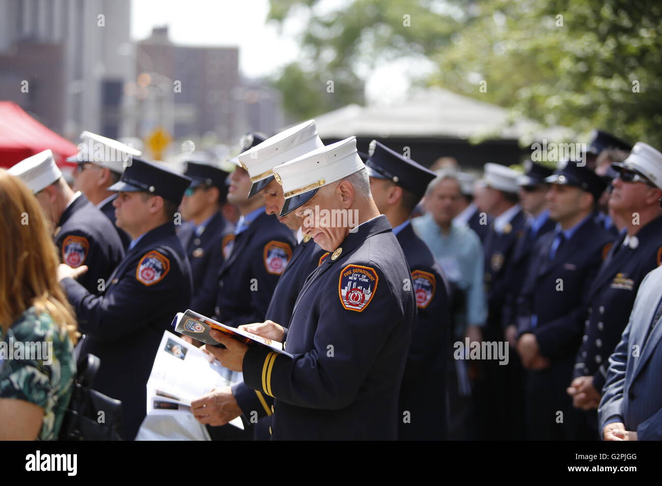 New York City, United States. 01st June, 2016. Reading program along with ceremony. NYC mayor Bill de Blasio & FDNY commissioner Daniel Nigro presided over the annual FDNY medal ceremony on the steps of city hall, honoring fire fighters & EMS personnel for acts of heroism in the preceding year Credit:  Andy Katz/Pacific Press/Alamy Live News Stock Photo