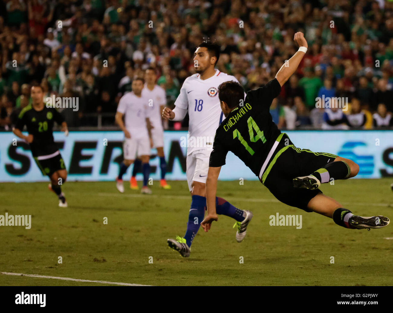 San Diego, California, USA. 01st June, 2016. Mexican Forward #14 Javier ''Chicharito'' Hernandez heads the ball into the goal during an international soccer match between Mexico and Chile at Qualcomm Stadium in San Diego, California. Mexico defeats Chile 1-0. Justin Cooper/CSM/Alamy Live News Stock Photo