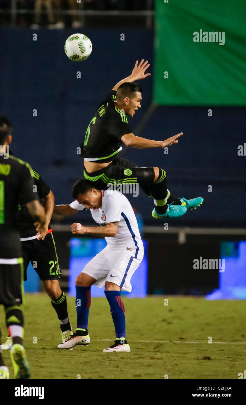 San Diego, California, USA. 01st June, 2016. Mexican Defenseman #6 Jorge Torres Nilo leaps over a Chilean player for the ball a draws a penalty during an international soccer match between Mexico and Chile at Qualcomm Stadium in San Diego, California. Mexico defeats Chile 1-0. Justin Cooper/CSM/Alamy Live News Stock Photo