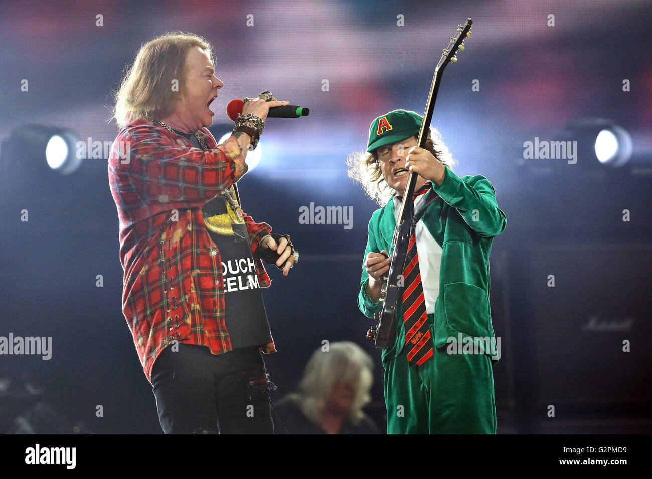 AC/DC guitarist Angus Young and temporary singer Axl Rose perform songs ...