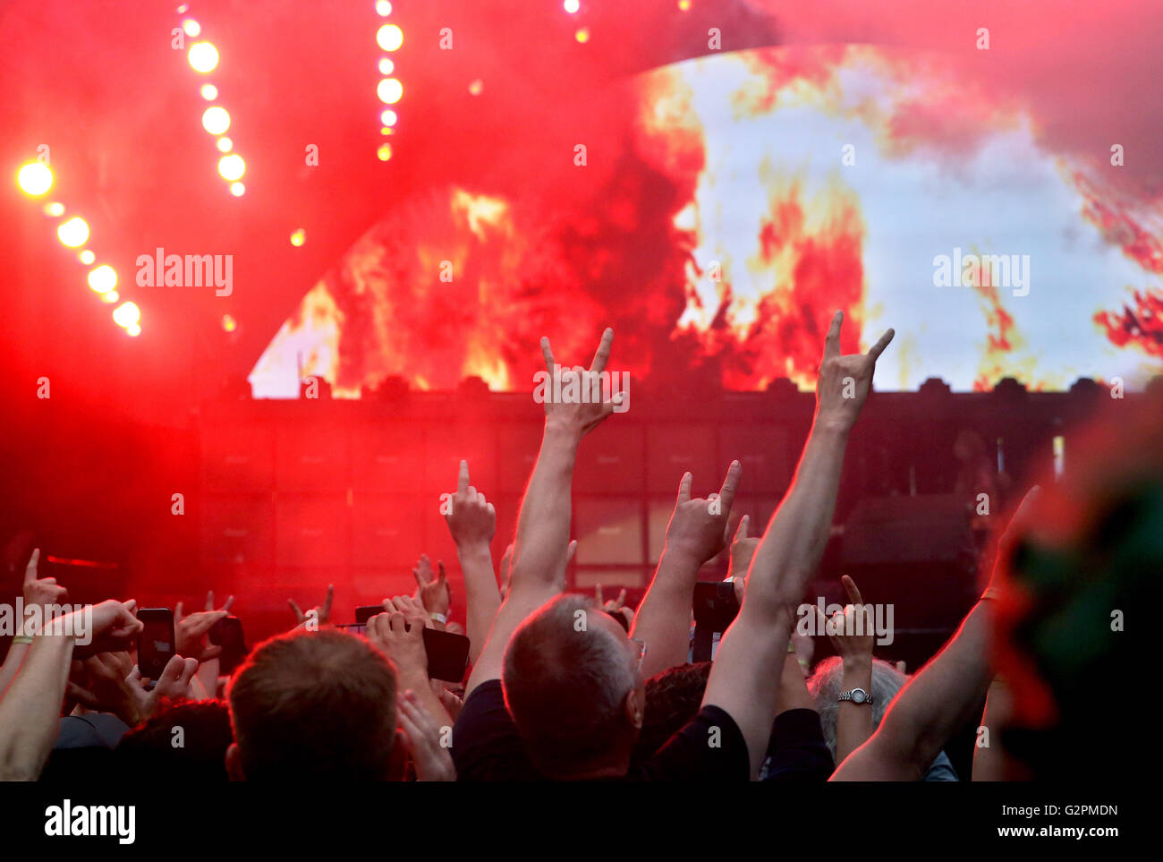Thousands of fans cheer durin a concert of the band Ac/DC at Red Bull ...