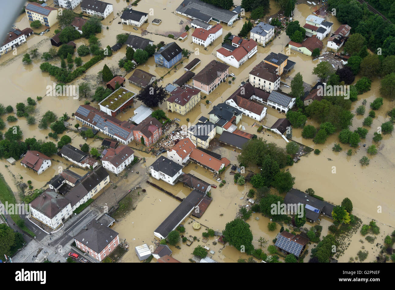 Simbach, Germany. 02nd June, 2016. View over flood damage in Simbach, Germany, 02 June 2016. Heavy storms and severe weather hit parts of southern Germany since 29 May causing floods and extensive damage. Photo: Tobias Hase/dpa/Alamy Live News Stock Photo