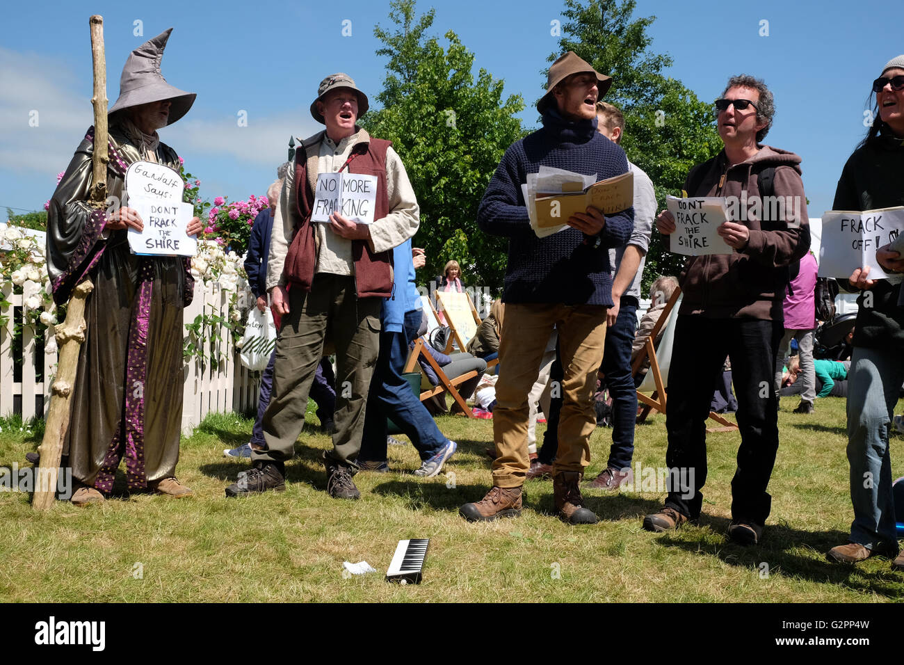 Hay Festival, Wales, UK - Thursday 2nd June 2016 -  A  group of environmentalists held an anti fracking protest at 11.45am signing songs in a circle on the Festival lawns to raise awareness of possible fracking in South Herefordshire. Stock Photo