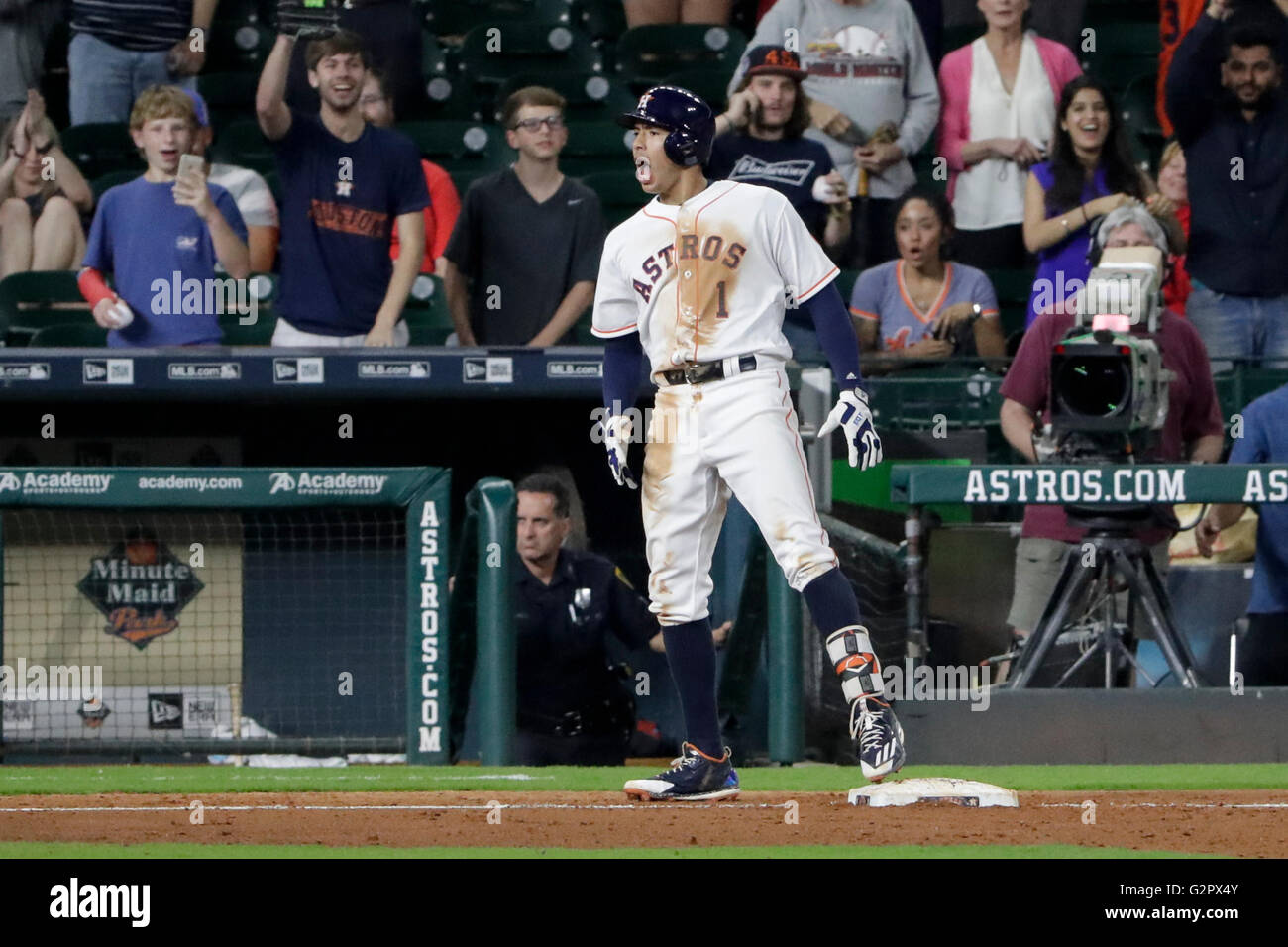 Houston, TX, USA. 1st June, 2016. Houston Astros shortstop Carlos Correa (1) celebrates after a triple during the Major League Baseball game between the Arizona Diamondbacks and the Houston Astros at Minute Maid Park in Houston, TX. The Astros defeated the Diamondbacks 5-4 in 11 innings Tim Warner/CSM/Alamy Live News Stock Photo