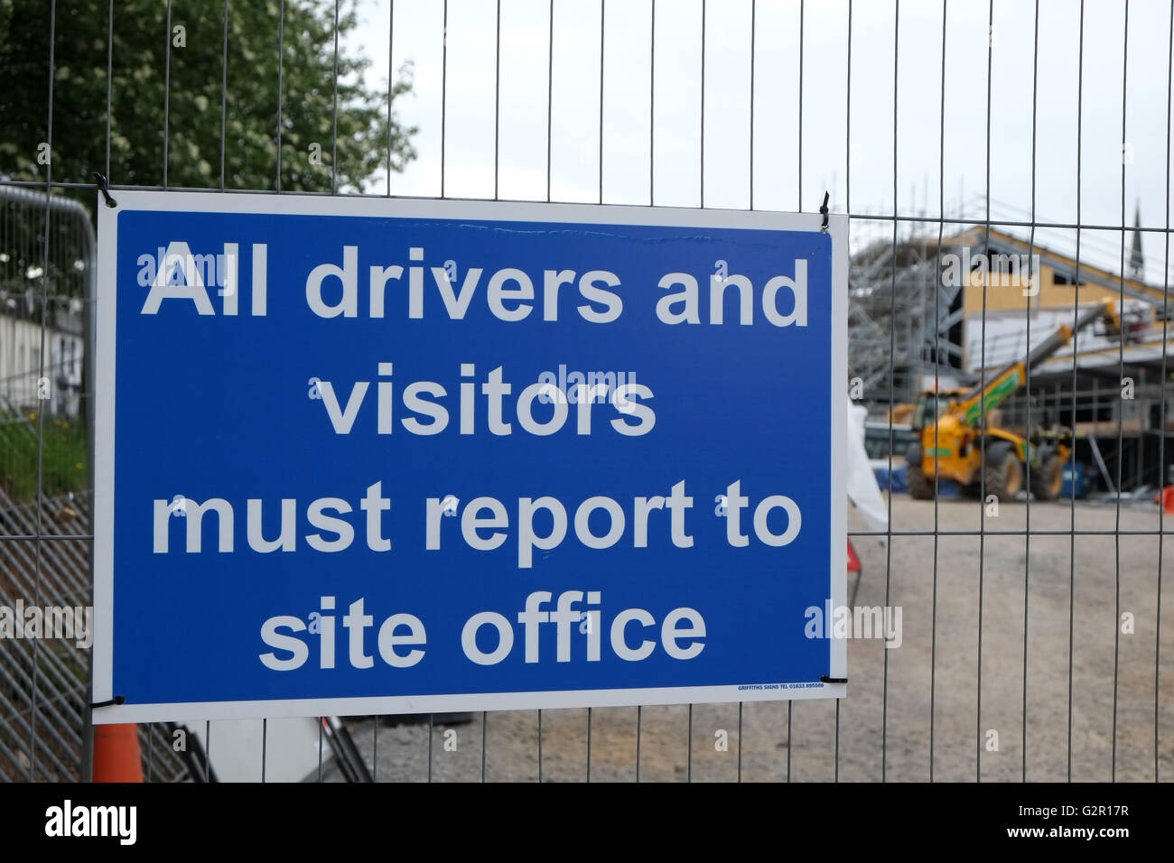 All Drivers And Visitors Must Report To Site Office Sign On The Gates Of A Construction Site In Cardiff Wales 1 June 16 Stock Photo Alamy