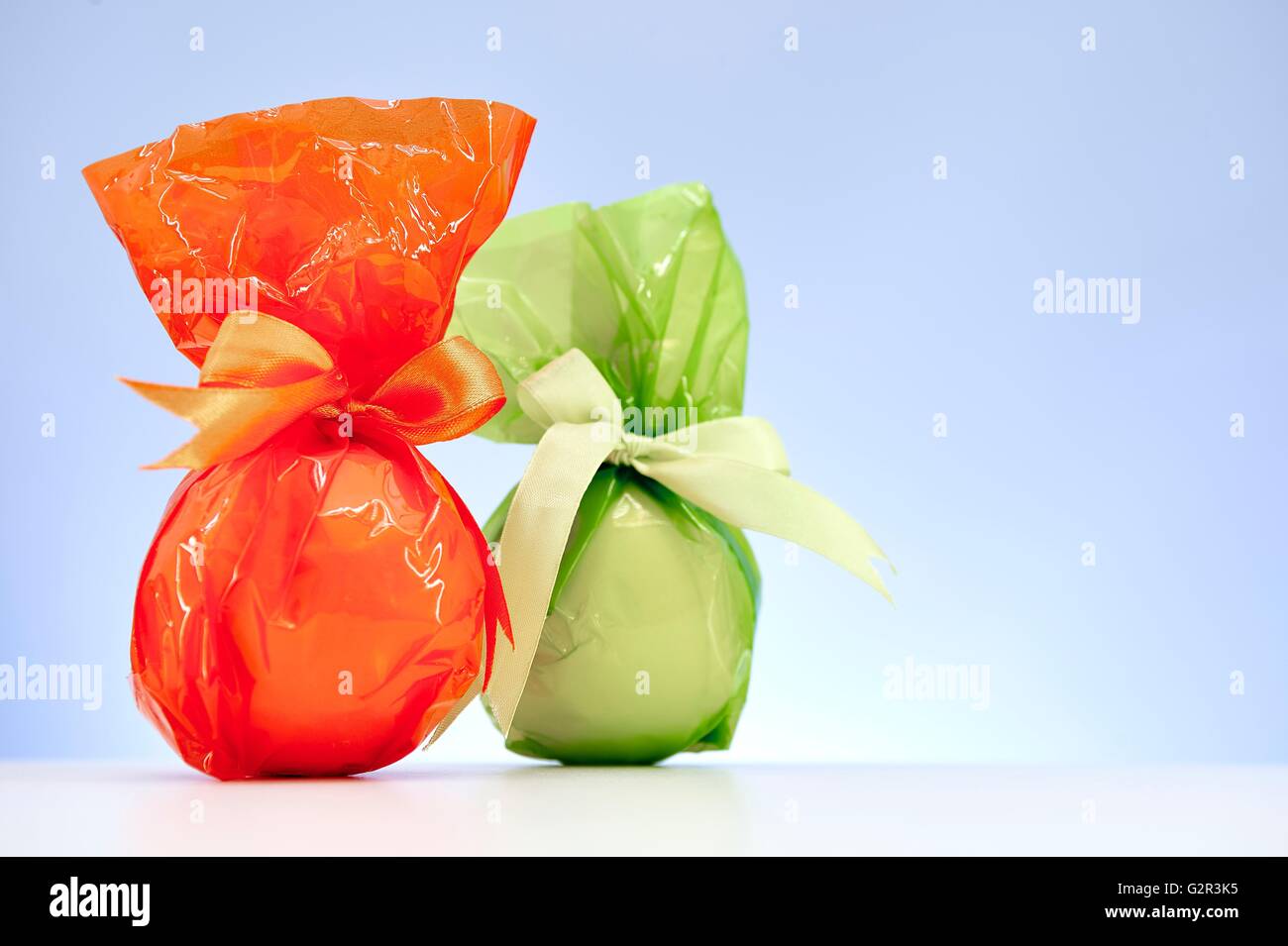 A studio photo of a gift wrapped in cellophane Stock Photo Alamy