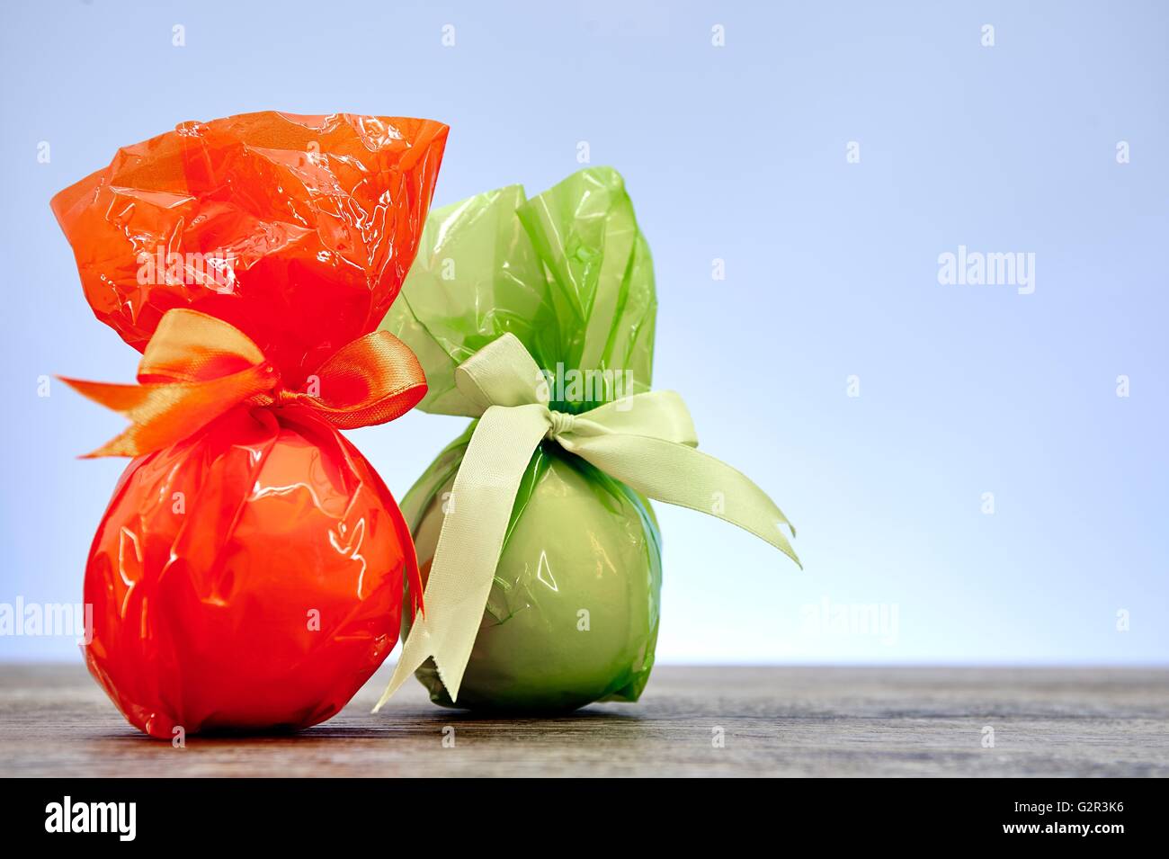A studio photo of a gift wrapped in cellophane Stock Photo Alamy