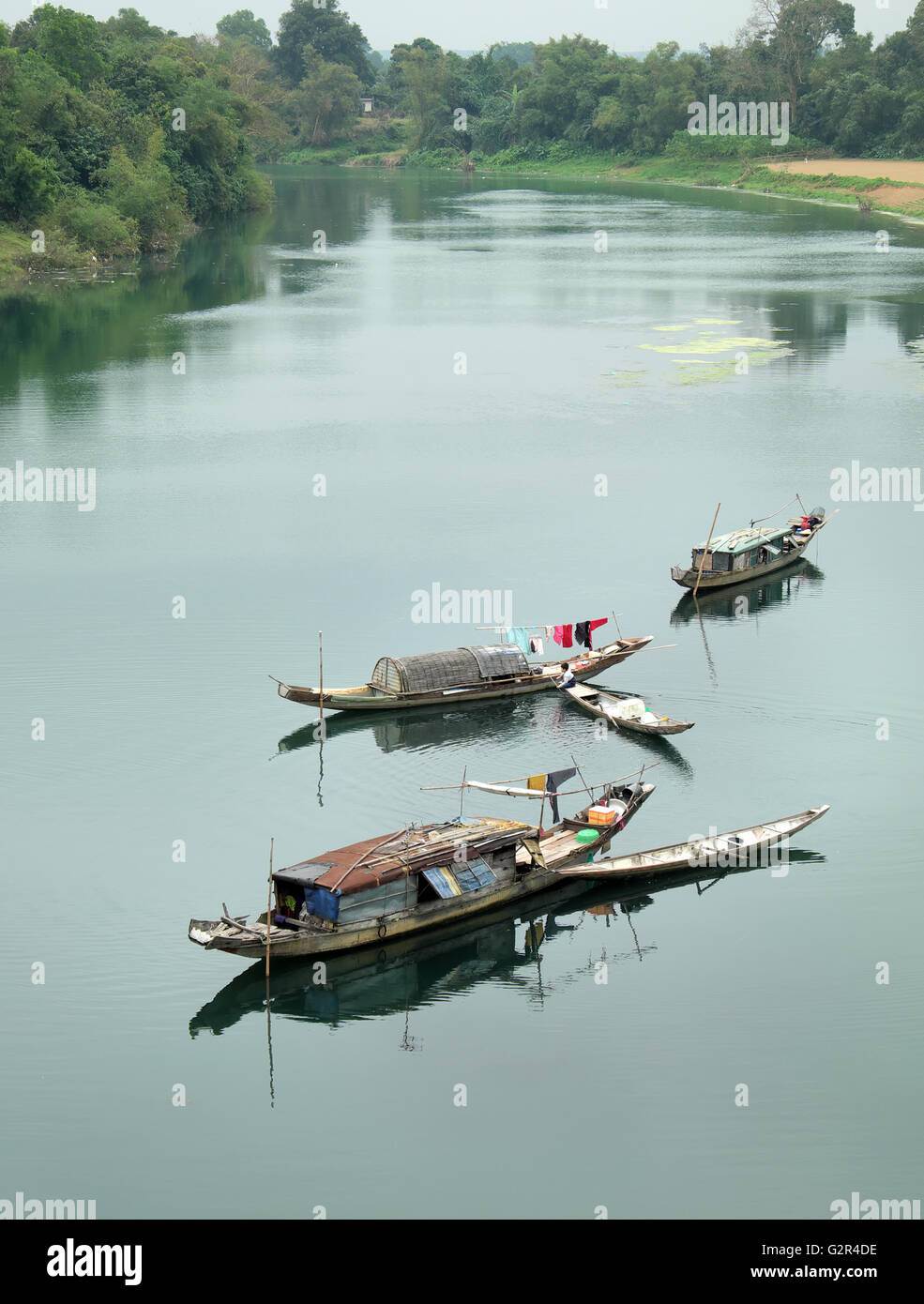 Beautiful landscape at Quang Binh countryside, Viet Nam on day, group of row boat floating on river at fishing village Stock Photo