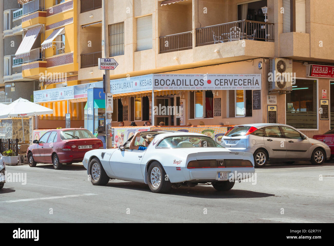 TORREVIEJA, SPAIN SEPTEMBER 13, 2014 White modern sportcar on sunny