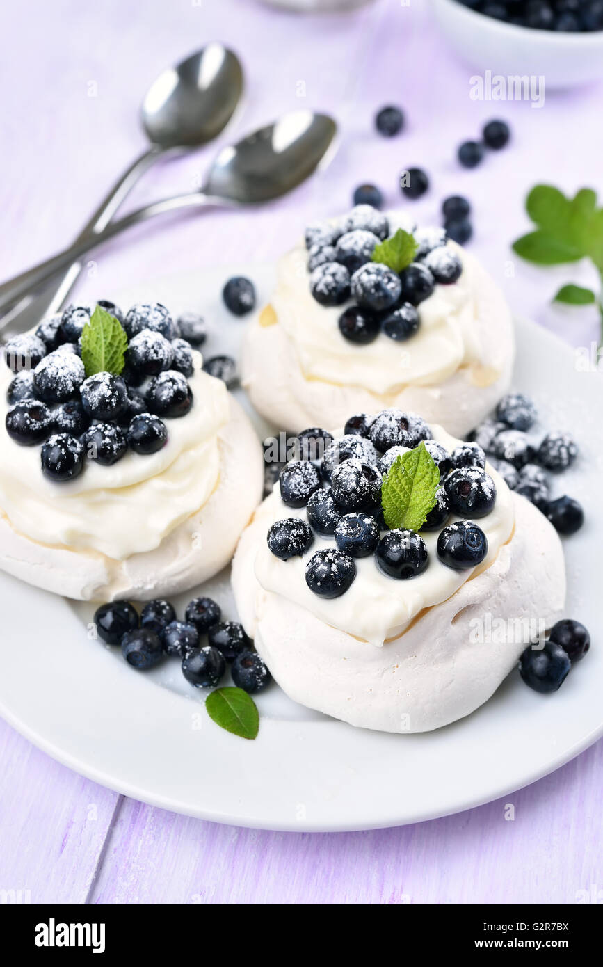 Blueberry pavlova, fruit meringue cakes Stock Photo Alamy