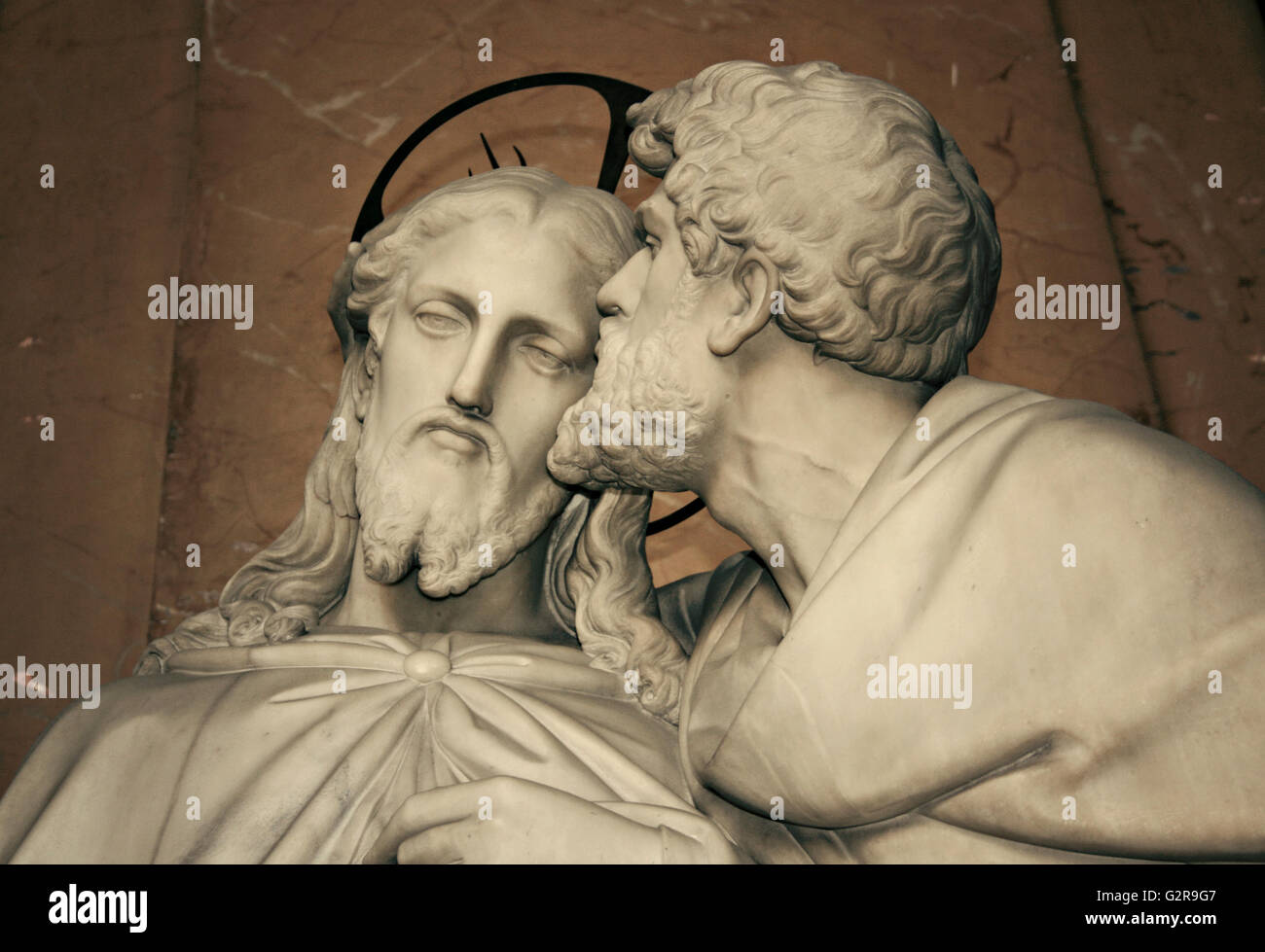Kiss of Judas, marble statue of Jesus and Judas, next to the Scala Sancta in the Lateran Palace, Rome, Italy Stock Photo