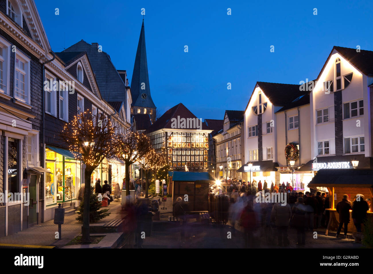 Christmas market at the old town hall with St. George's Church at back, historic old town at night, Hattingen, Ruhr district Stock Photo