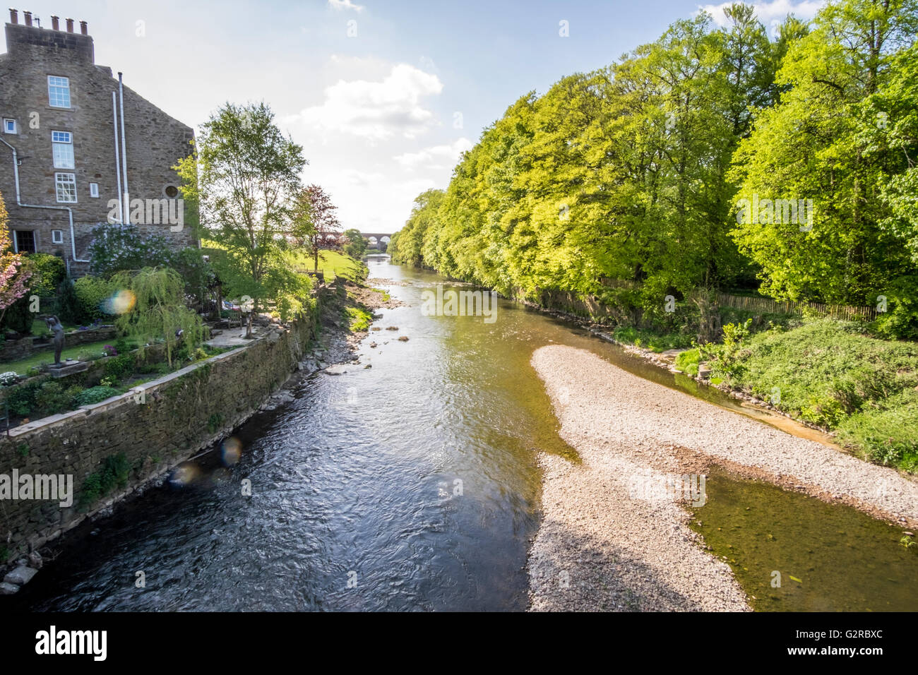 A river running through a small village of Whalley, this river flooded in the bad rainfall of winter 2015 Stock Photo
