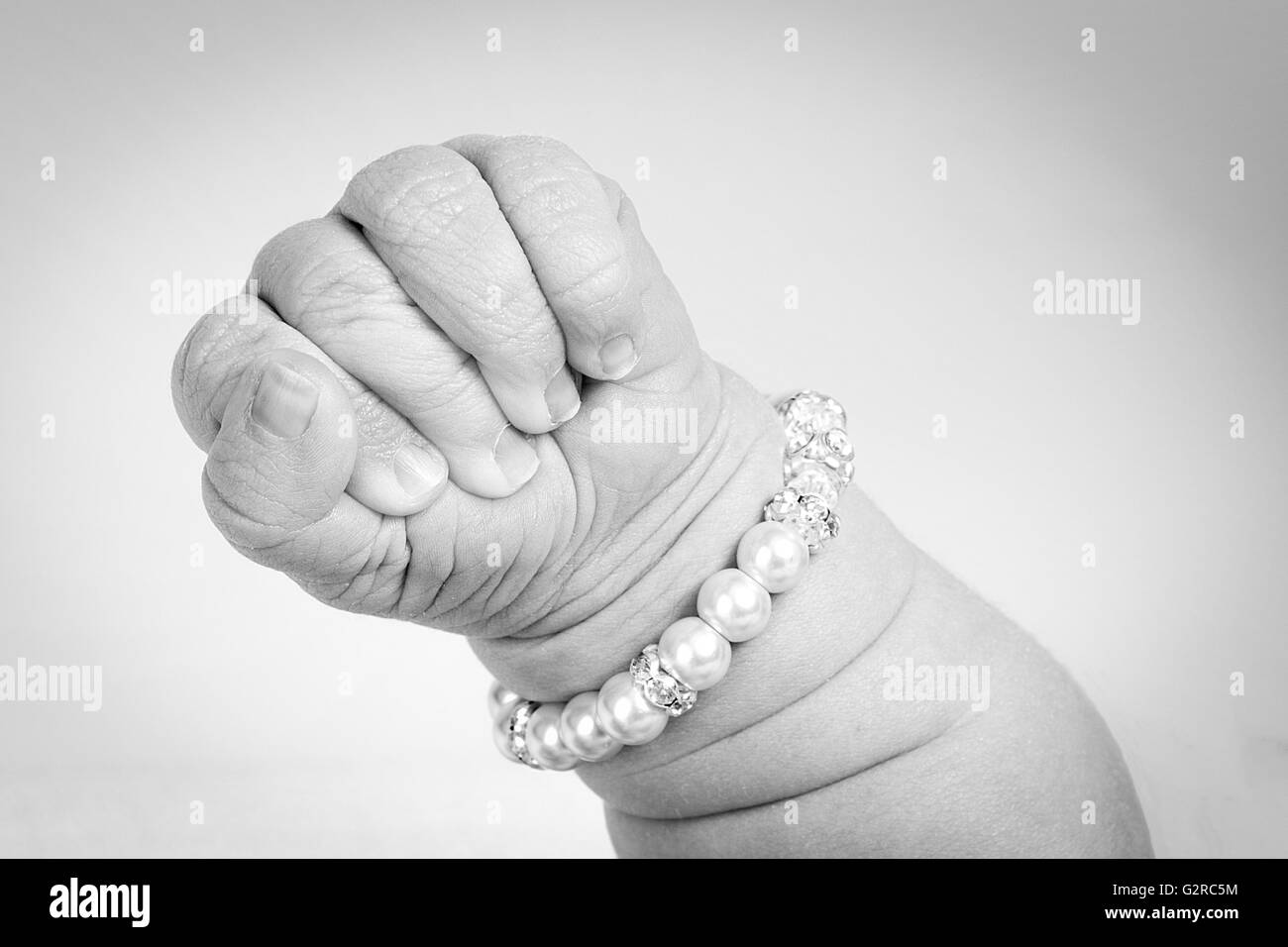 Baby fist Black and White Stock Photos Images Alamy