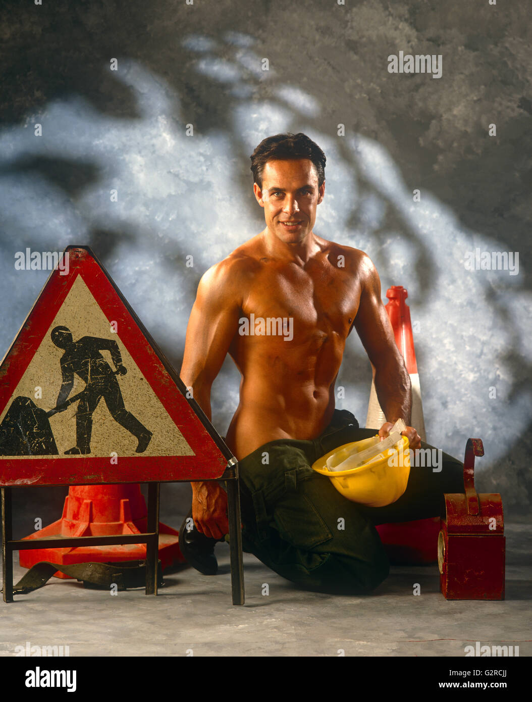 A man dressed up as a road worker Stock Photo
