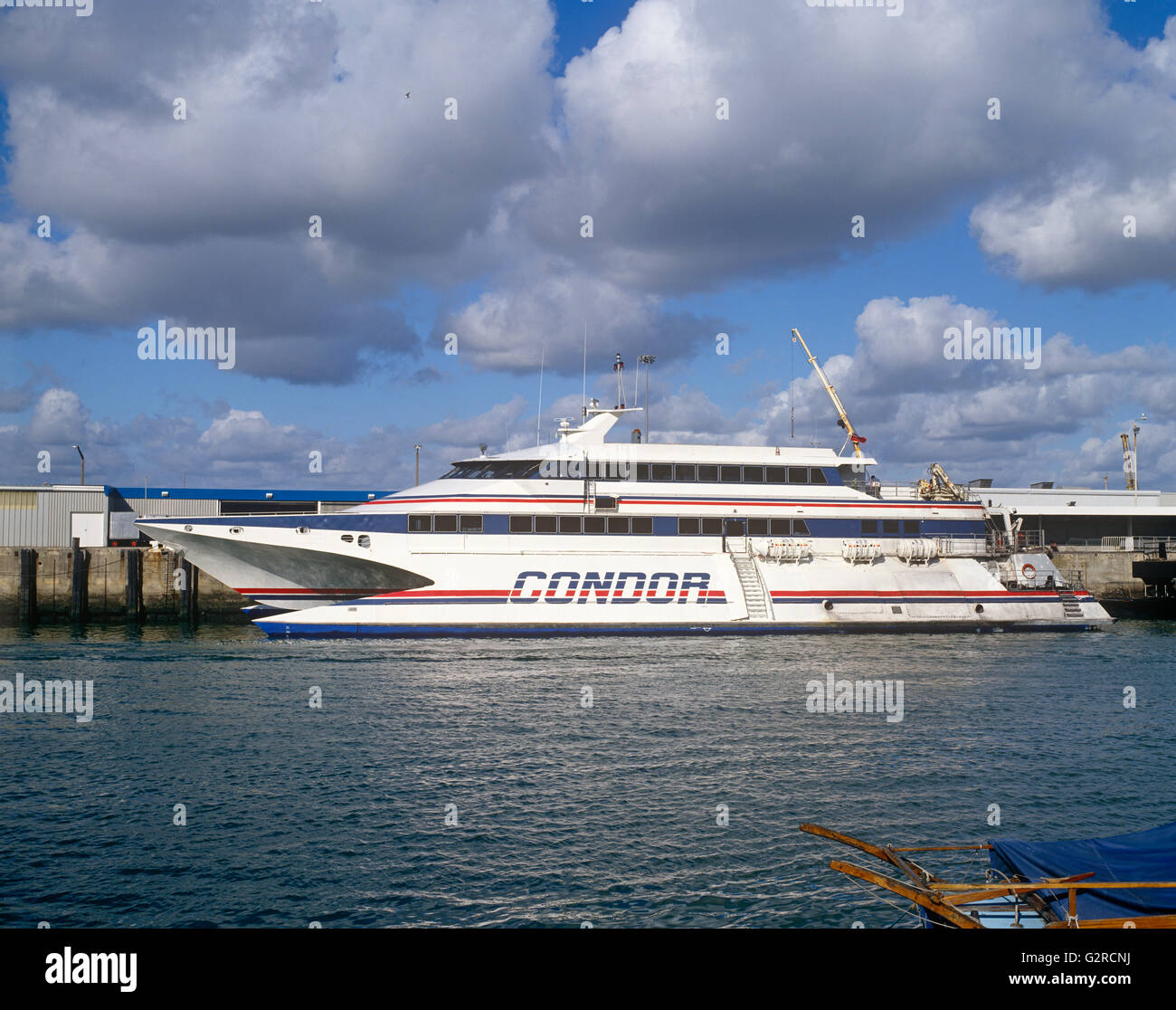 A ship docked up on the water, outside Stock Photo