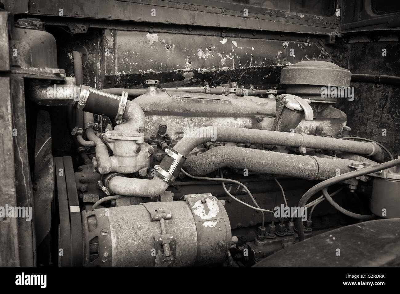 A rusty and dirty old bus engine. Stock Photo
