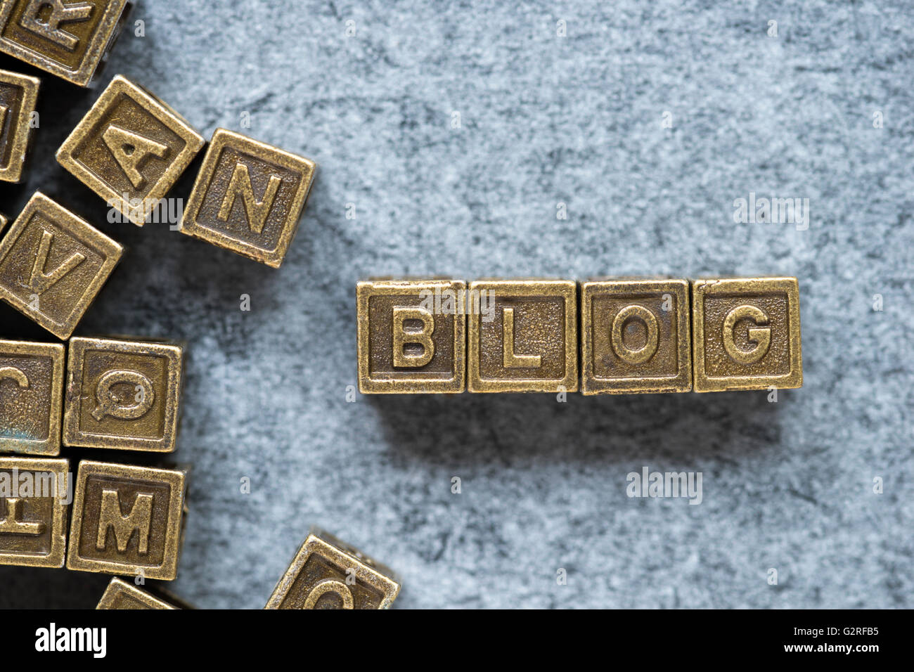 blog word made from metallic blocks over grunge background Stock Photo