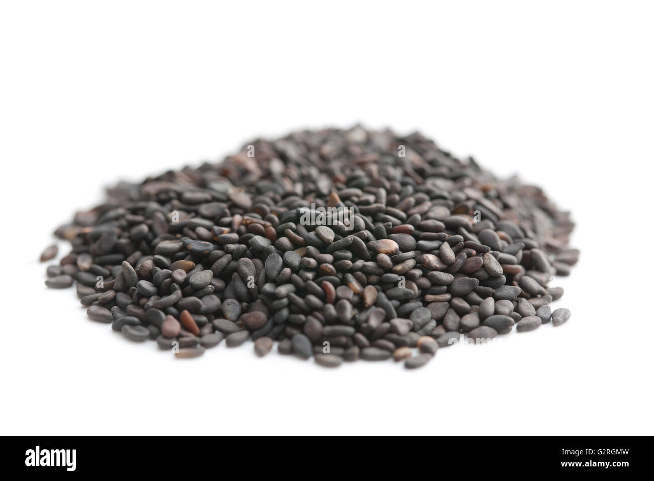 Black sesame seeds. Healthy sesame seeds isolated on white background