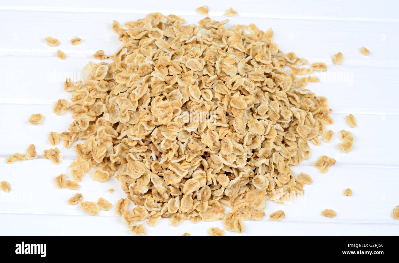 Group of oats on wooden table Stock Photo