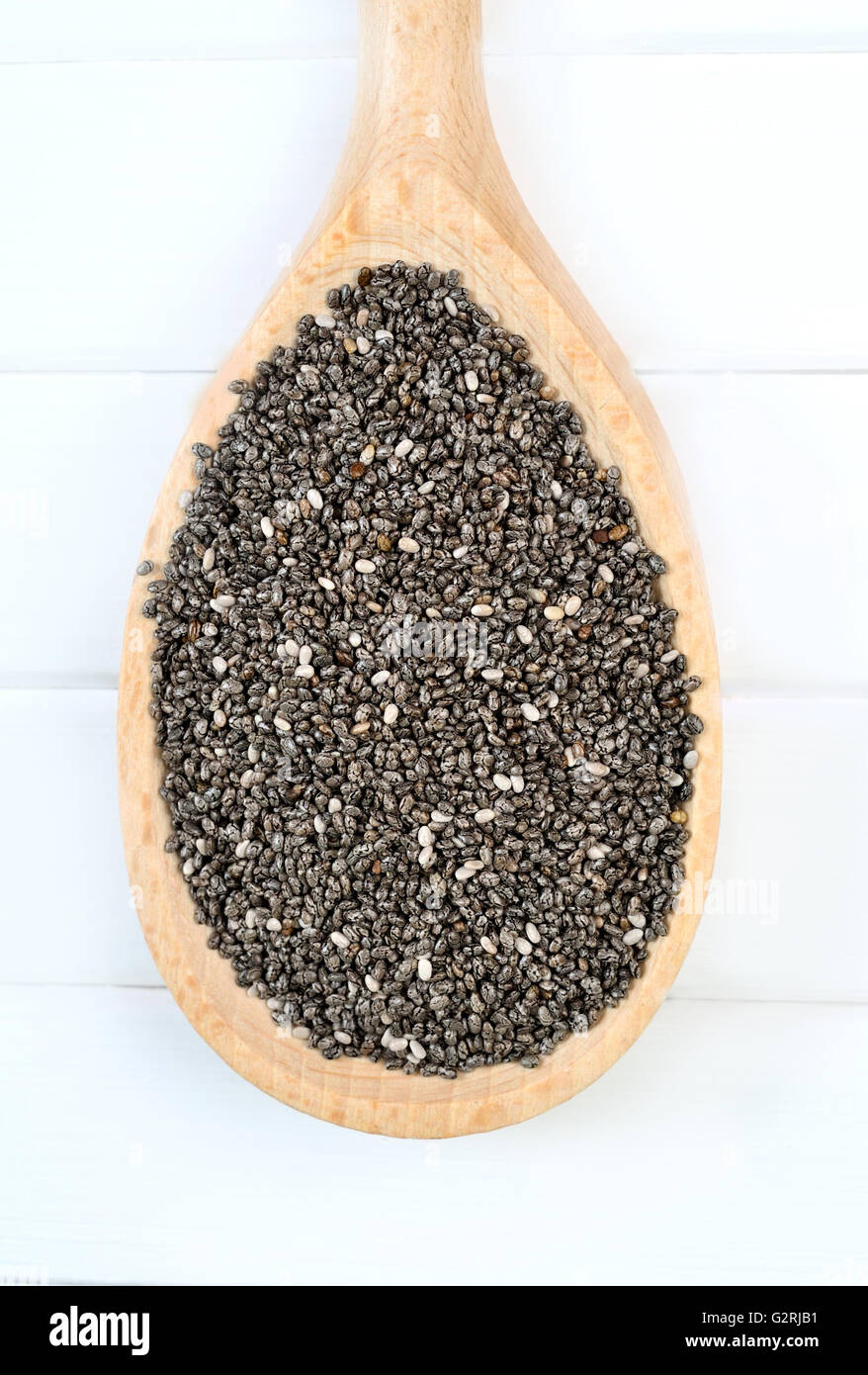 Chia seeds on wooden spoon Stock Photo