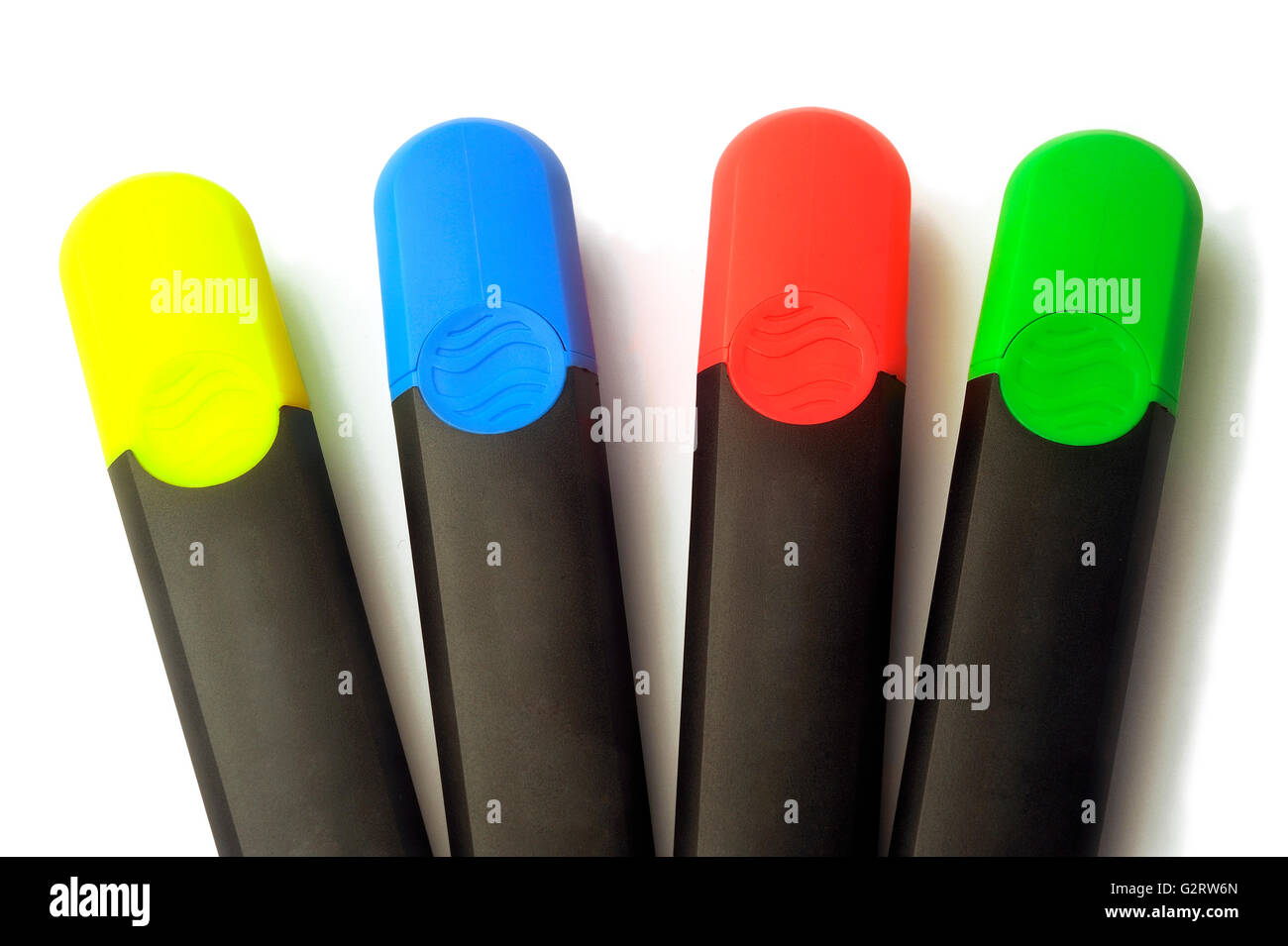 Highlighters blue, green, red and yellow on white background Stock Photo