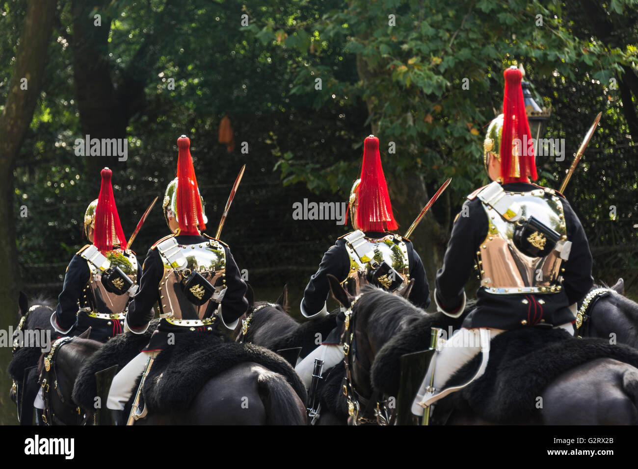A Close-up of four of the Royal Army soldiers and their gear, riding to Buckingham Palace, London, England. Stock Photo