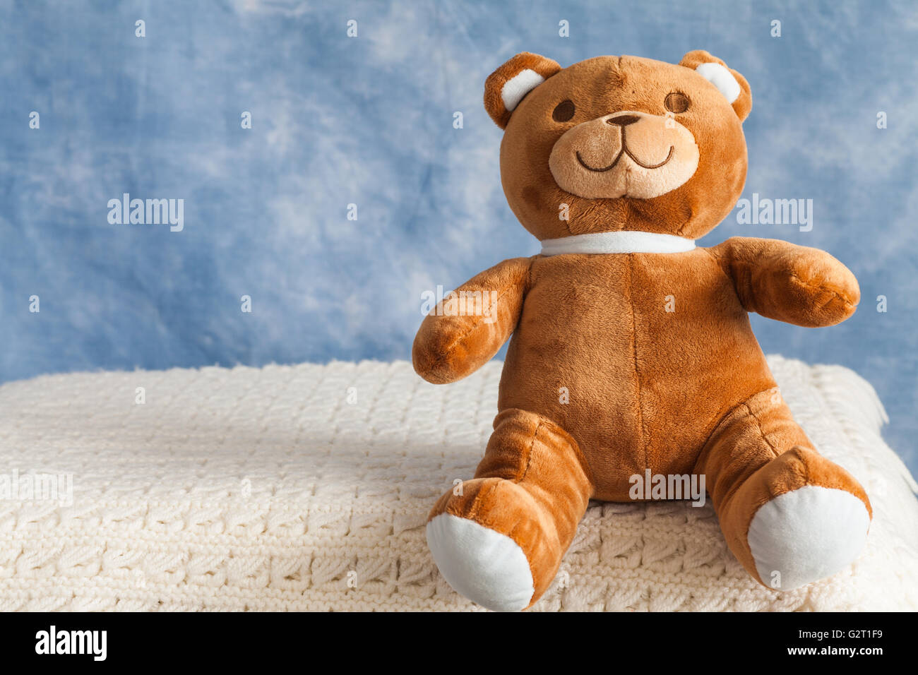 Teddy Bear toy on blue sky background with copyspace Stock Photo - Alamy