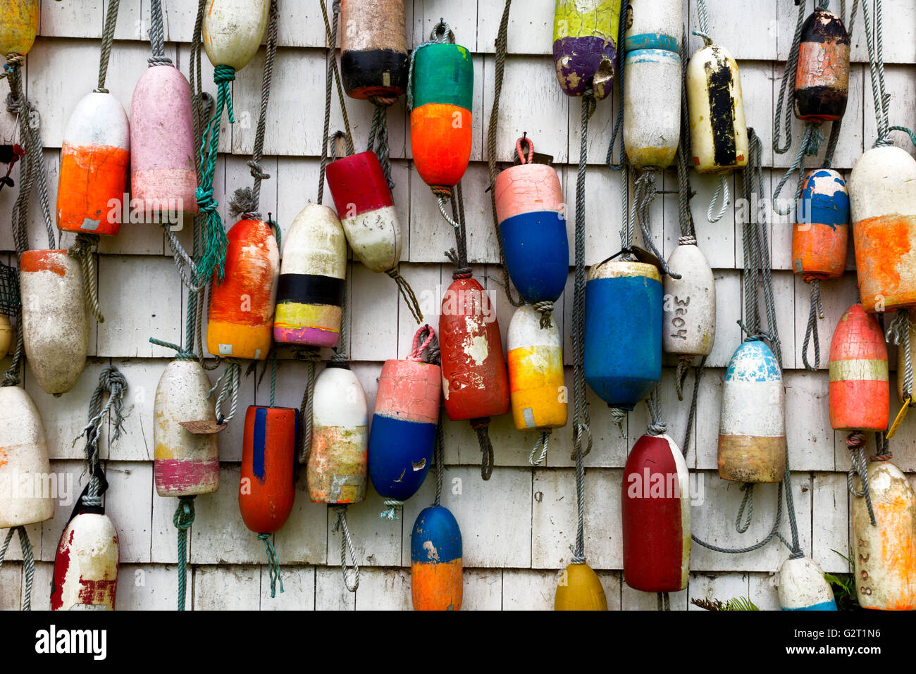 OR02144-00...OREGON - Floats hanging on a shed wall in the town of Warrenton. Stock Photo
