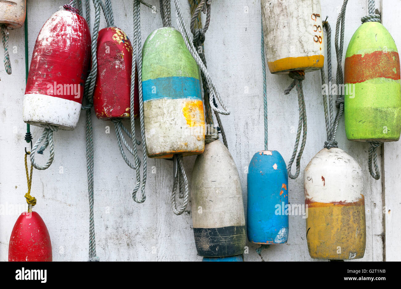 OR02150-00...OREGON - Floats hanging on a shed wall in the town of Warrenton. Stock Photo