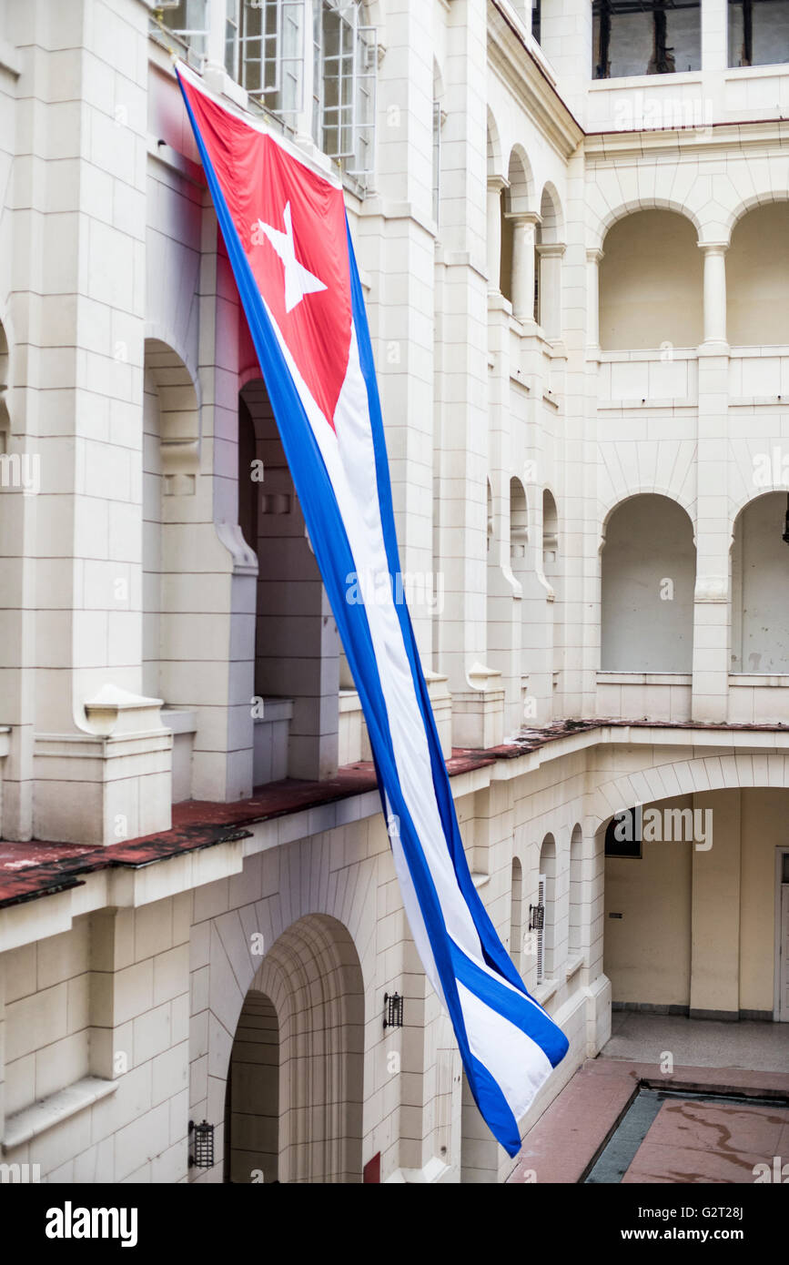 Cuban flag on the former Presidential Palace of dictator Batista, now Revolution Museum. La Havana, Cuba, Caribbean Stock Photo