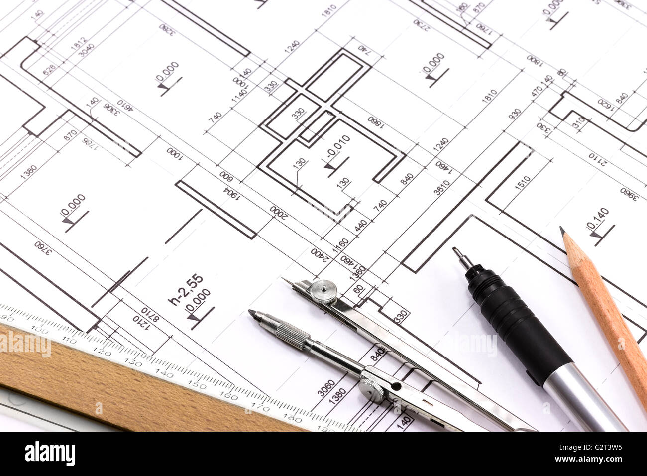 Architectural background with technical drawings and work tools Stock