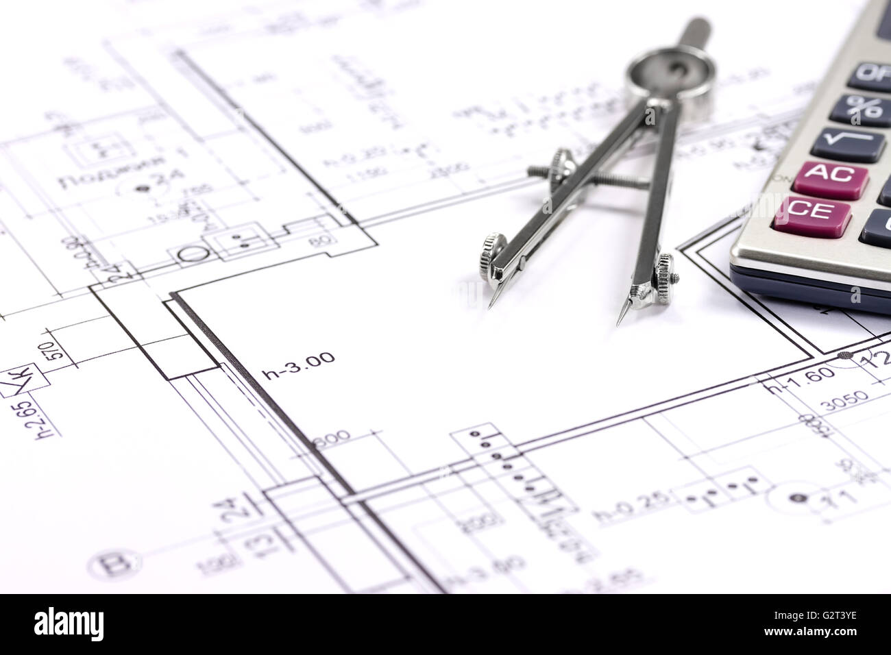House building construction plans with calculator, pencil and compass Stock  Photo - Alamy