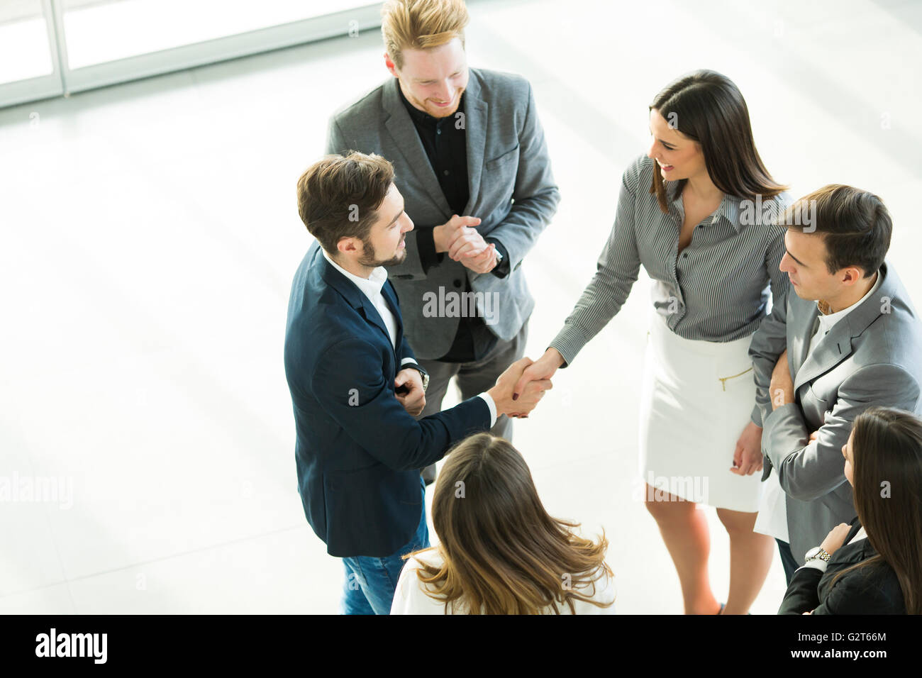 Group of young peopple in the modern office, viewed from above Stock Photo