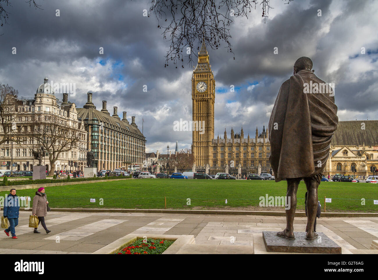 The bronze statue of Mahatma Gandhi by the sculptor Philip Jackson in Parliament Square,Westminster ,London, United Kingdom Stock Photo