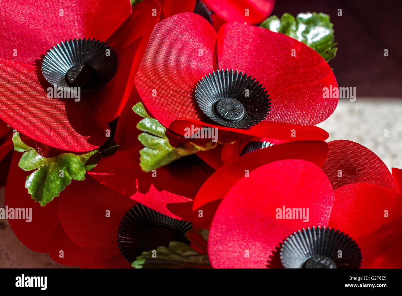 Red poppies on a Remembrance Day wreath in London ,UK Stock Photo