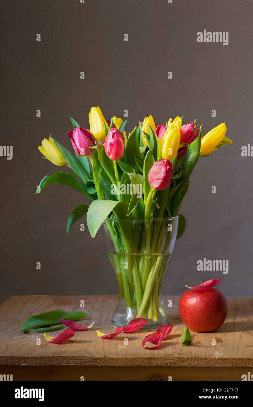 Still life with a bunch of yellow and red tulips Stock Photo - Alamy