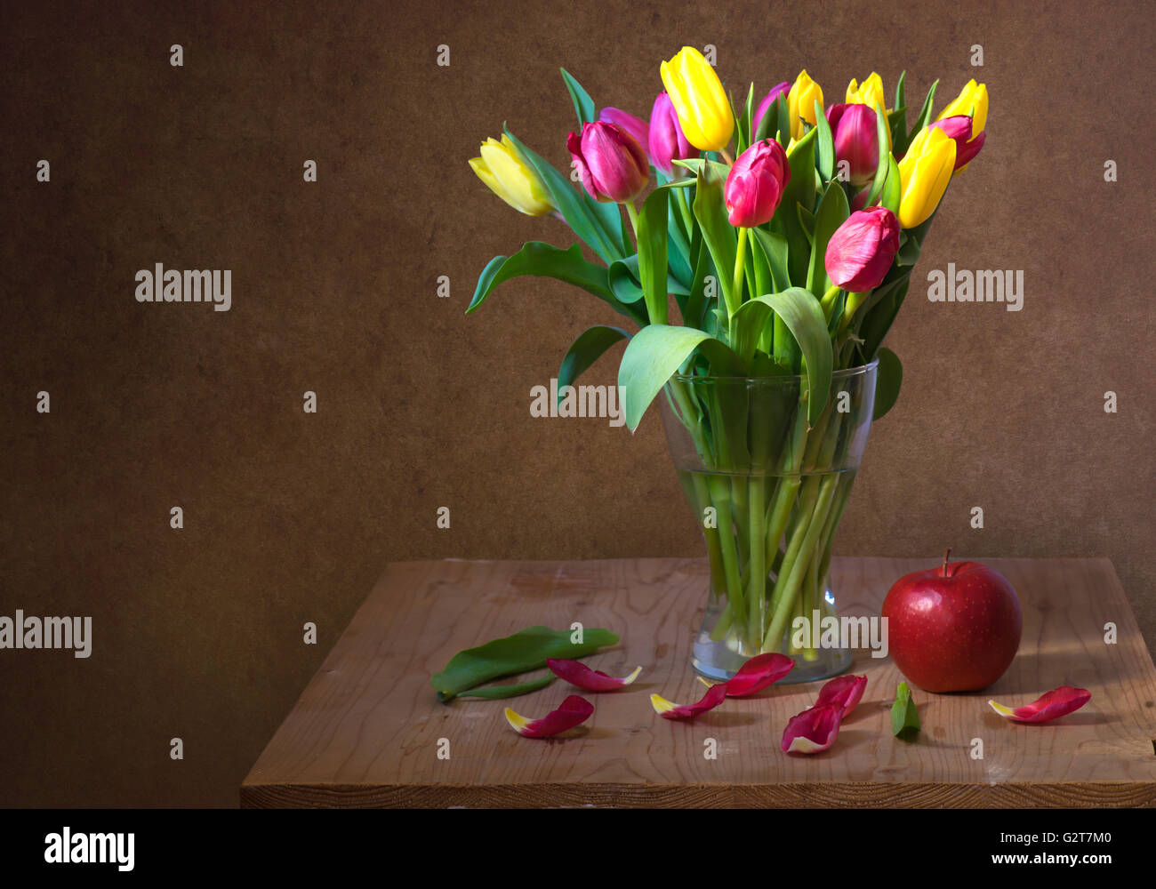 Still life with red and yellow tulips Stock Photo - Alamy