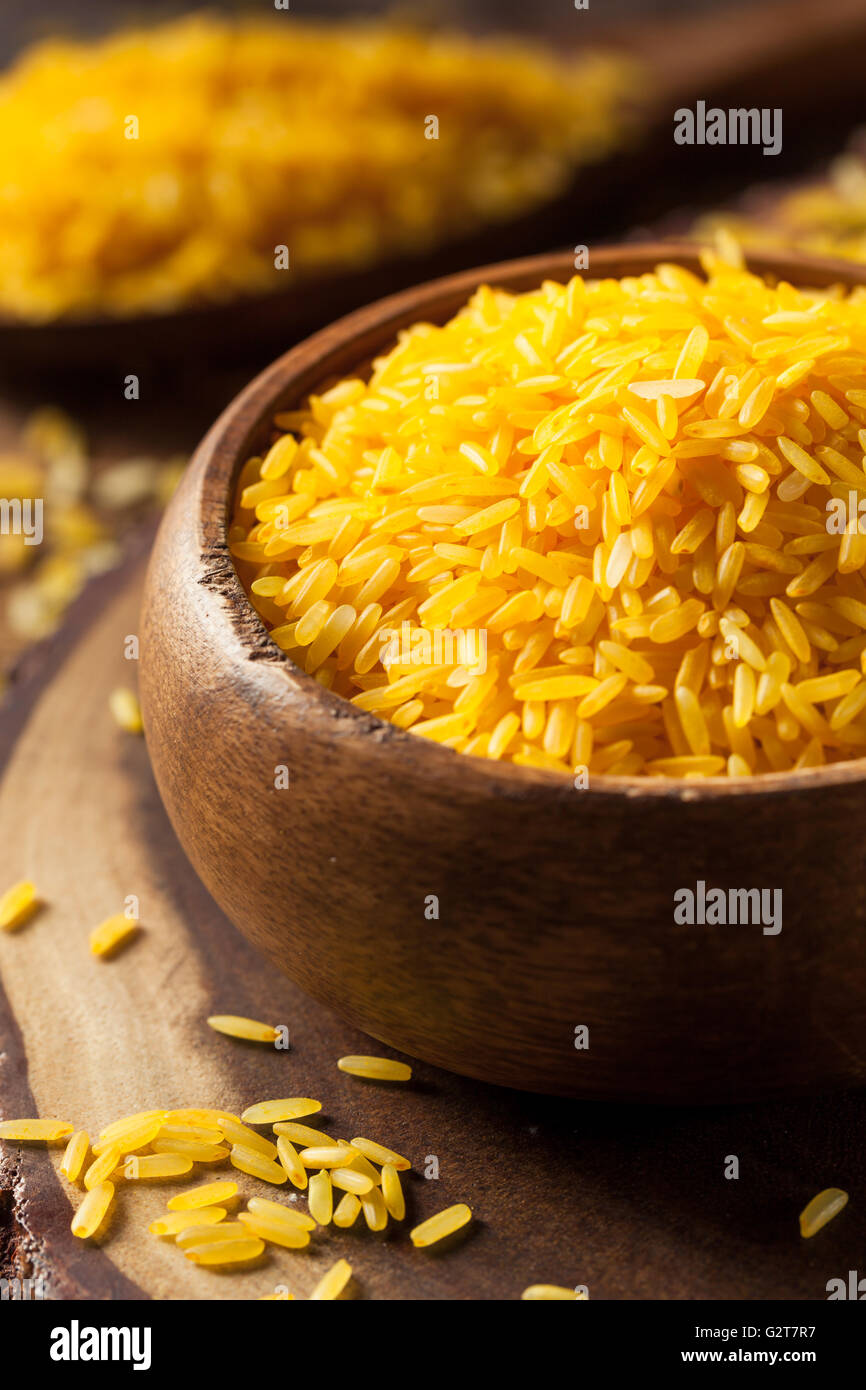 Raw Organic Yellow Saffron Rice in a Bowl Stock Photo - Alamy