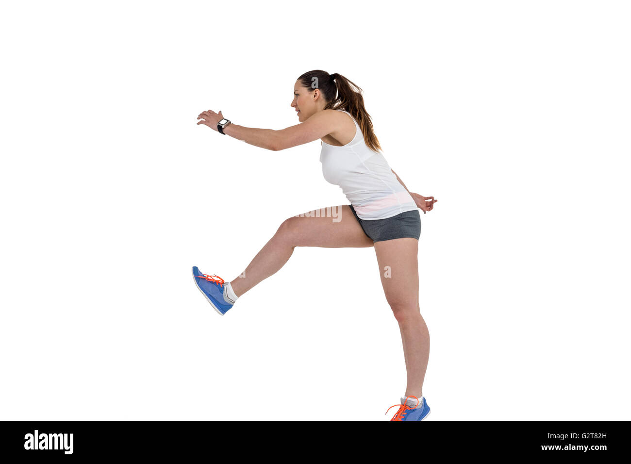 Athlete woman running on white background Stock Photo