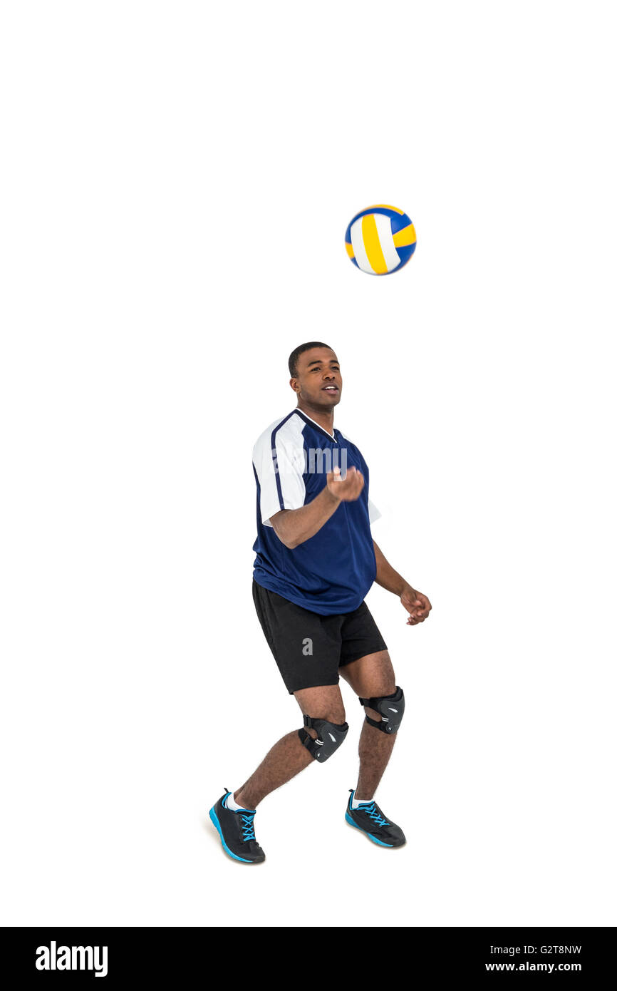 Sportsman playing a volleyball Stock Photo Alamy