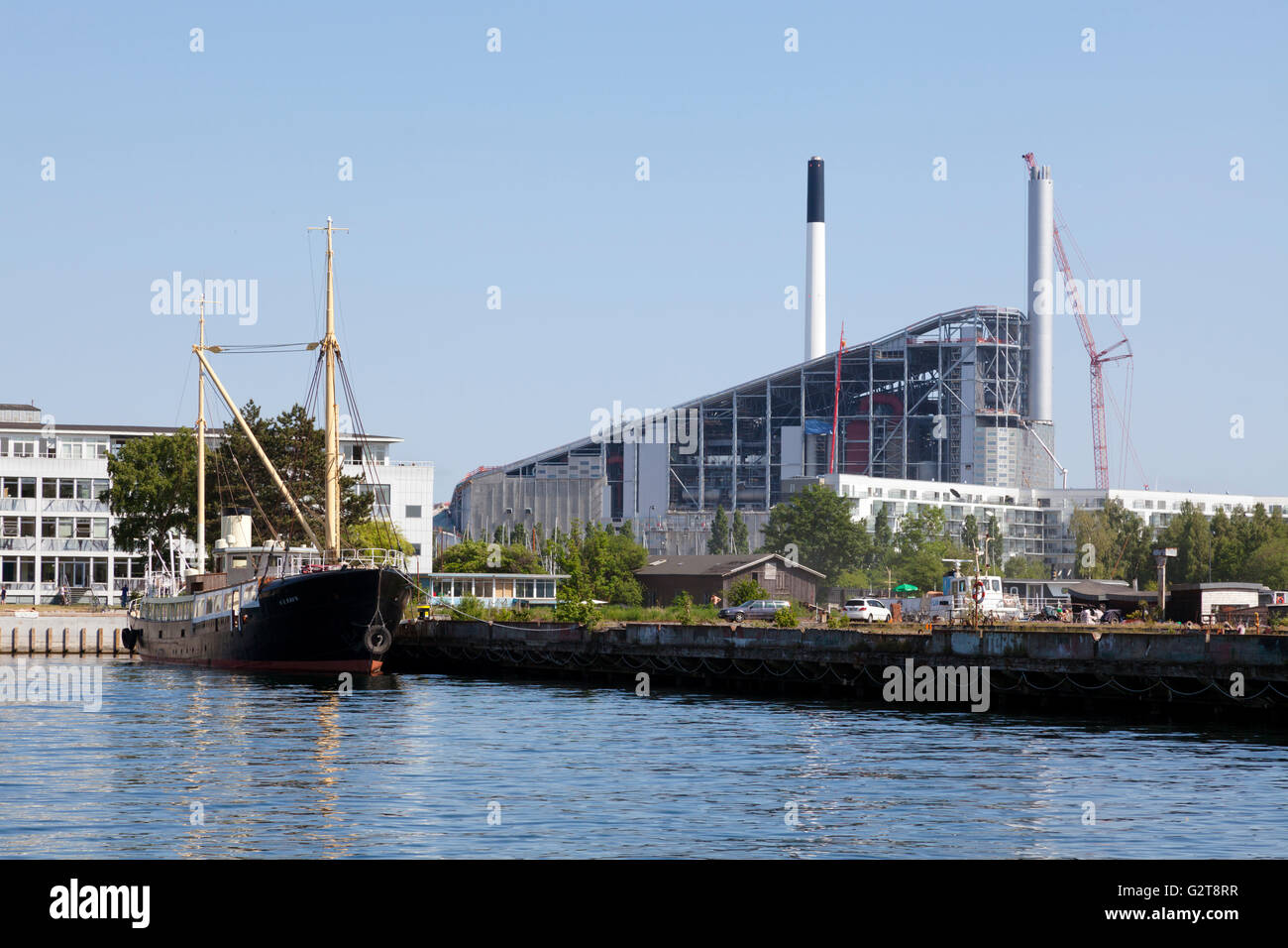 The new Amager Slope, CopenHill, and waste-to-energy power plant designed by Bjarke Ingels seen from the inner harbour. Stock Photo