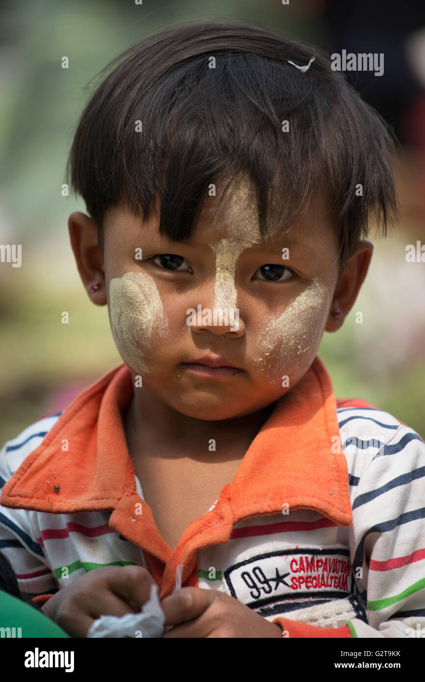 Young boy with thanaka paste on his face, Tangguyi, Shan State, Myanmar Stock Photo