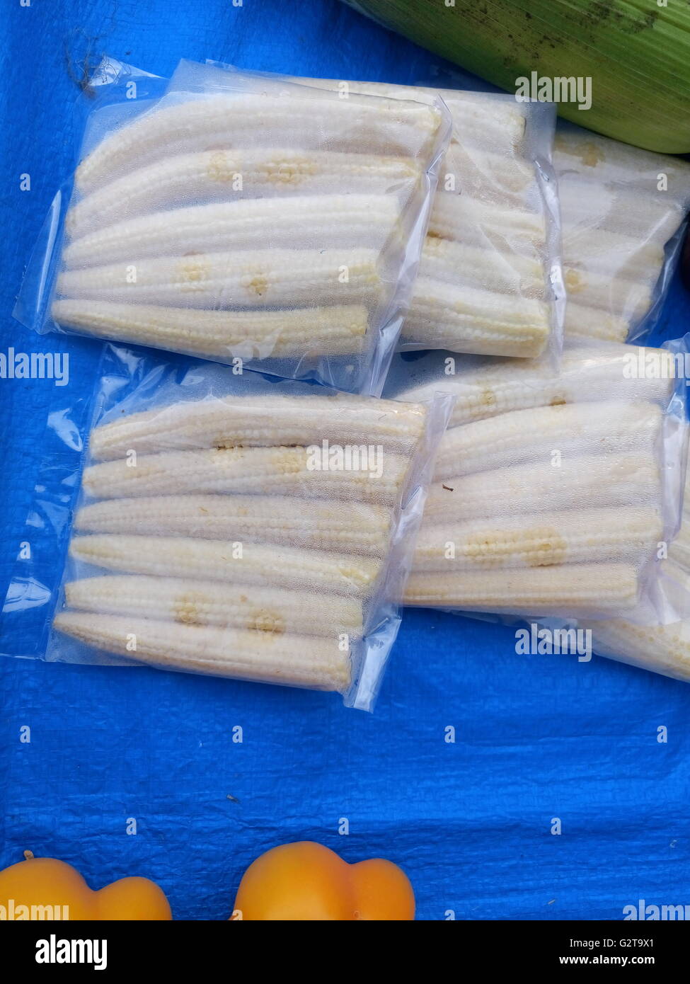 Full frame shot of baby corns for sale Stock Photo