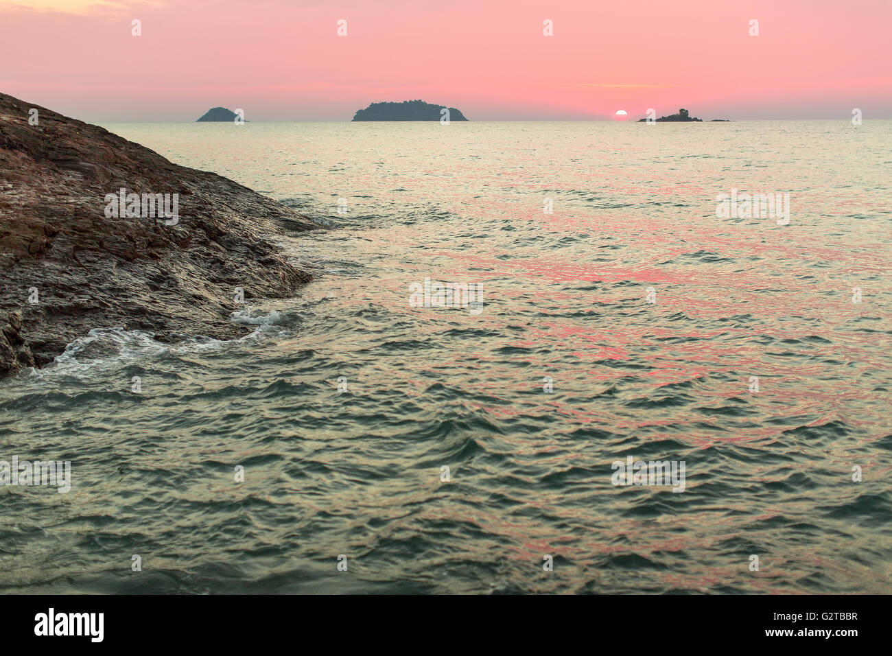 Beautiful sunset rocky beach on hi-res stock photography and images - Alamy