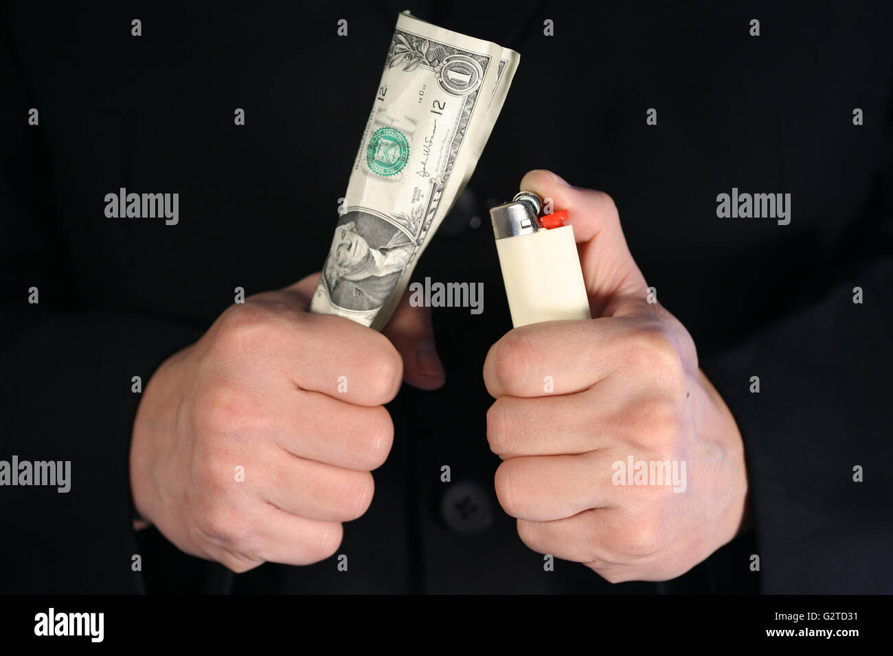 Burning away or throw away money Stock Photo Alamy