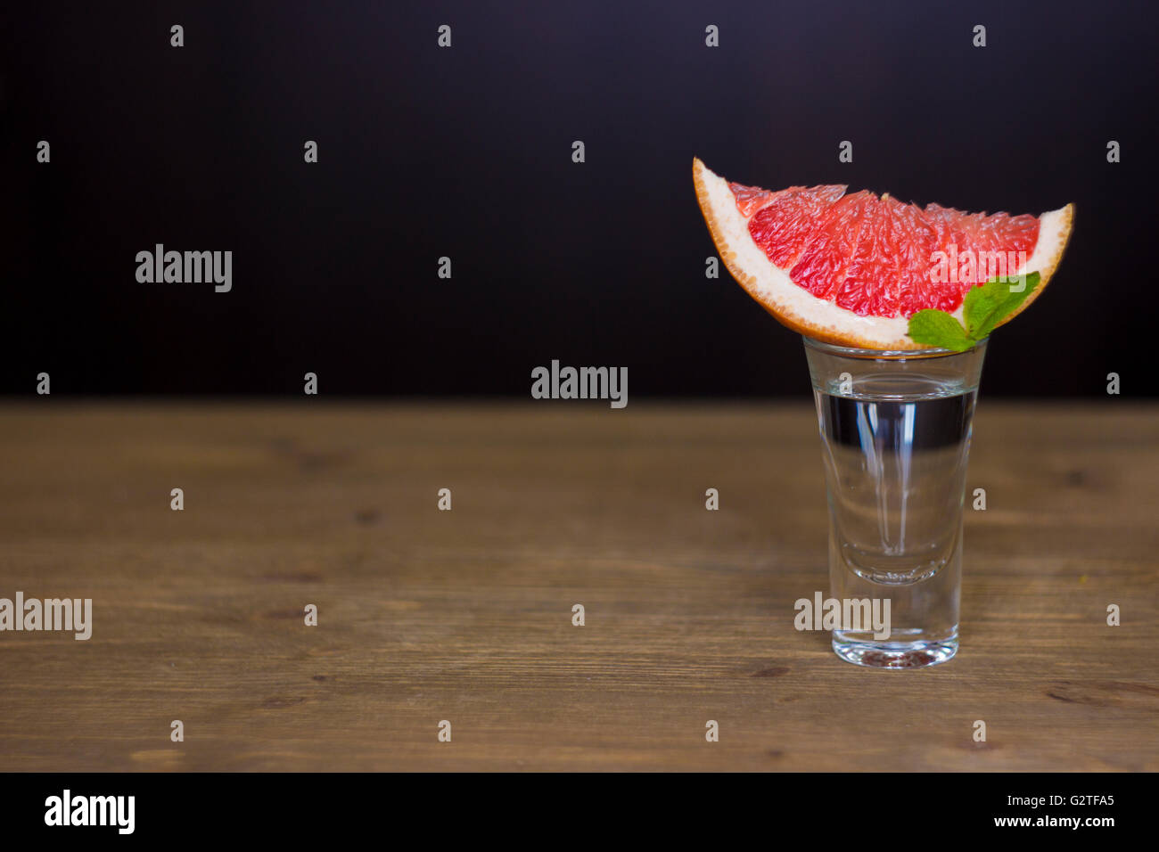 Tequila shot with grapefruit Stock Photo Alamy