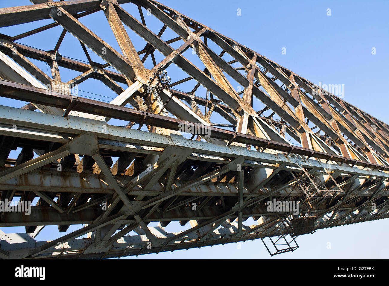 Old railway bridge over the blue sky Stock Photo